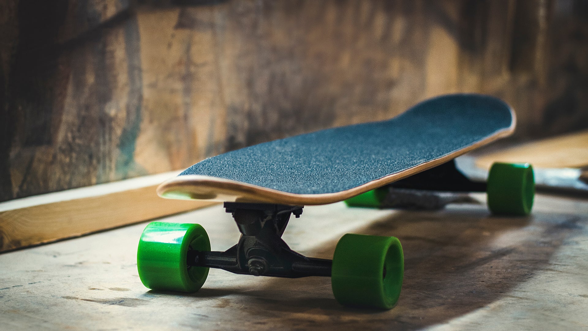 A green wheel skateboard