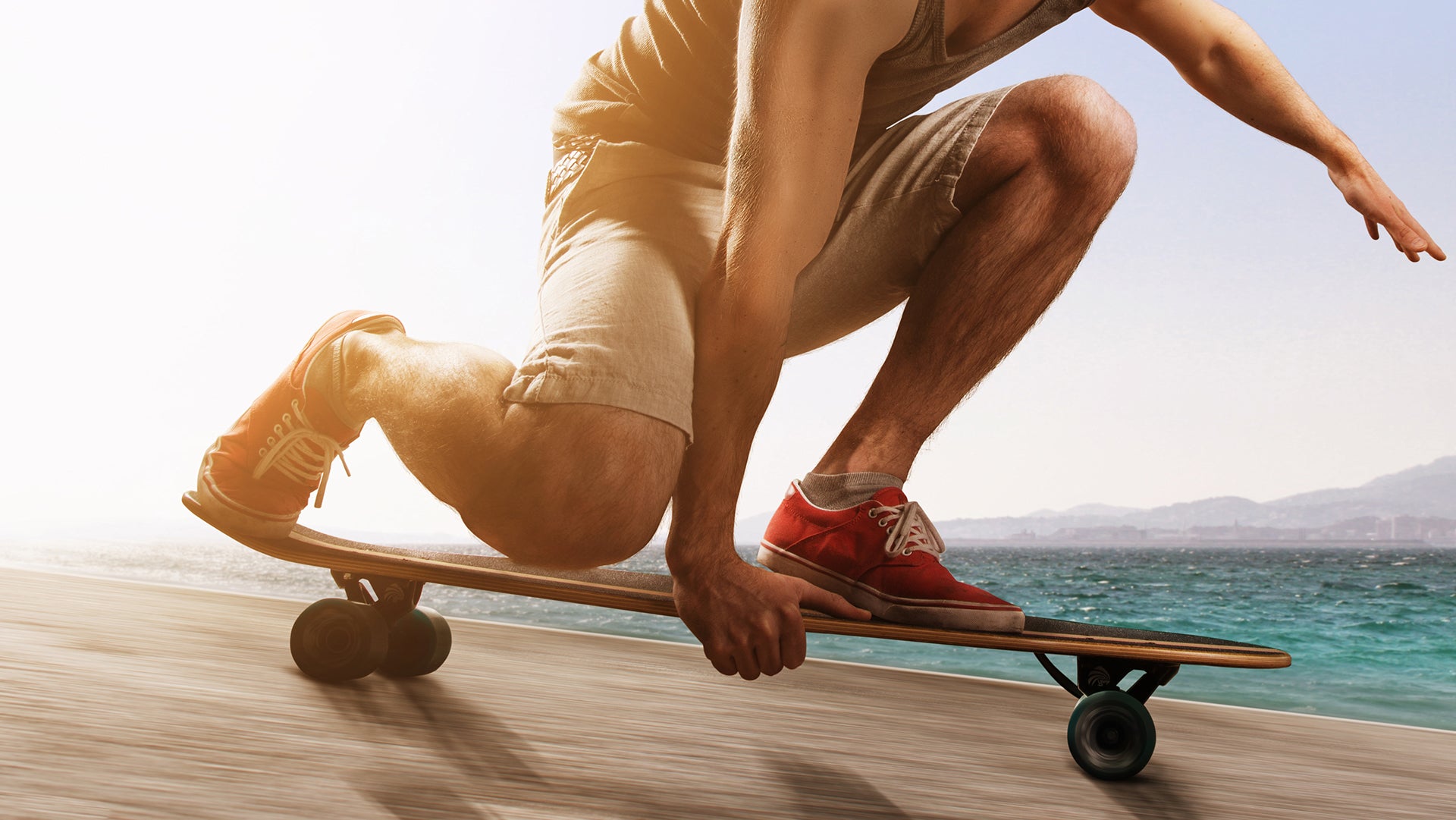 Practicing to skate in across a beach